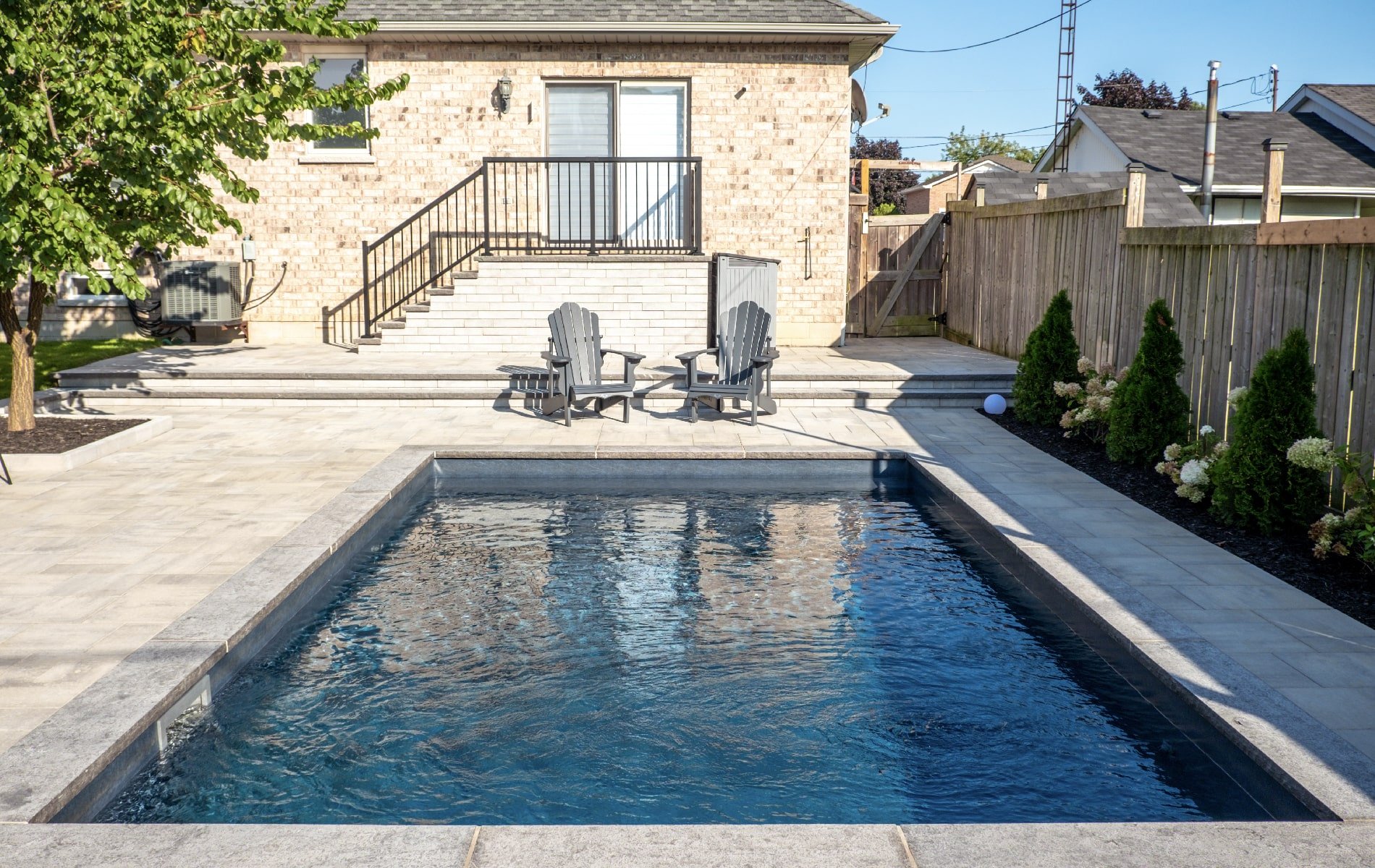 Beautiful Garden, Landscaping and Pool in Hamilton, Ontario. Build by Boulder Design.