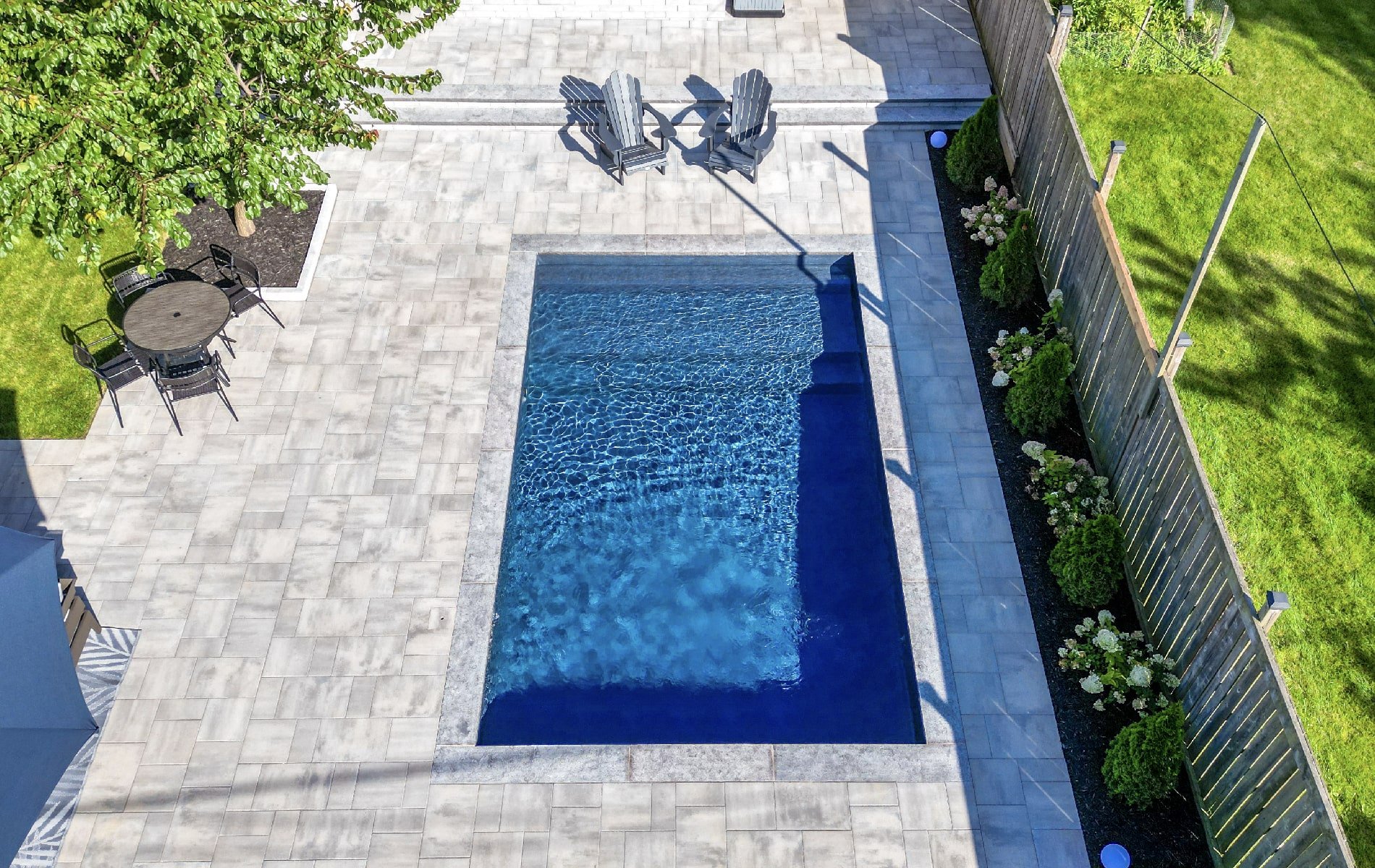 Beautiful Garden, Landscaping and Pool in Hamilton, Ontario. Build by Boulder Design.