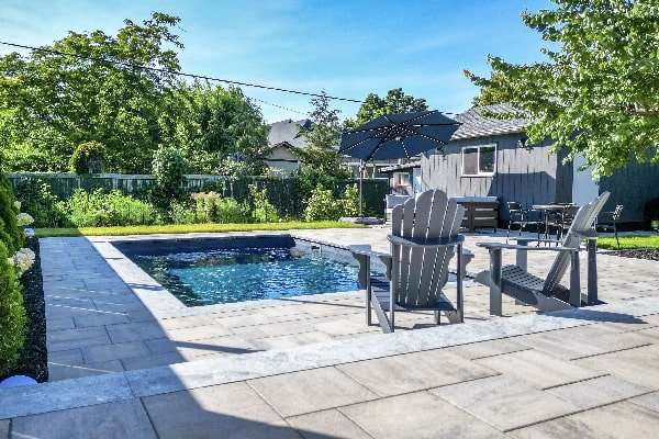 Beautiful Garden, Landscaping and Pool in Hamilton, Ontario. Build by Boulder Design.