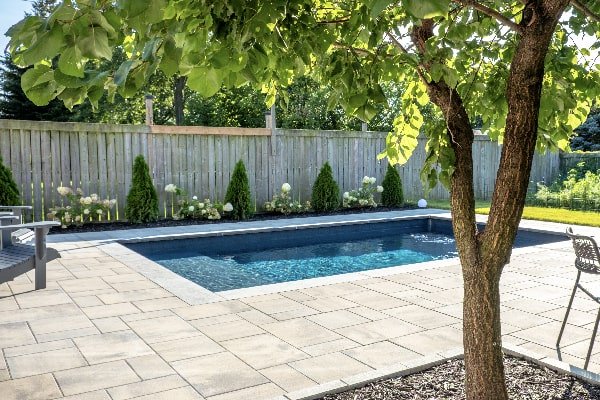 Beautiful Garden, Landscaping and Pool in Hamilton, Ontario. Build by Boulder Design.