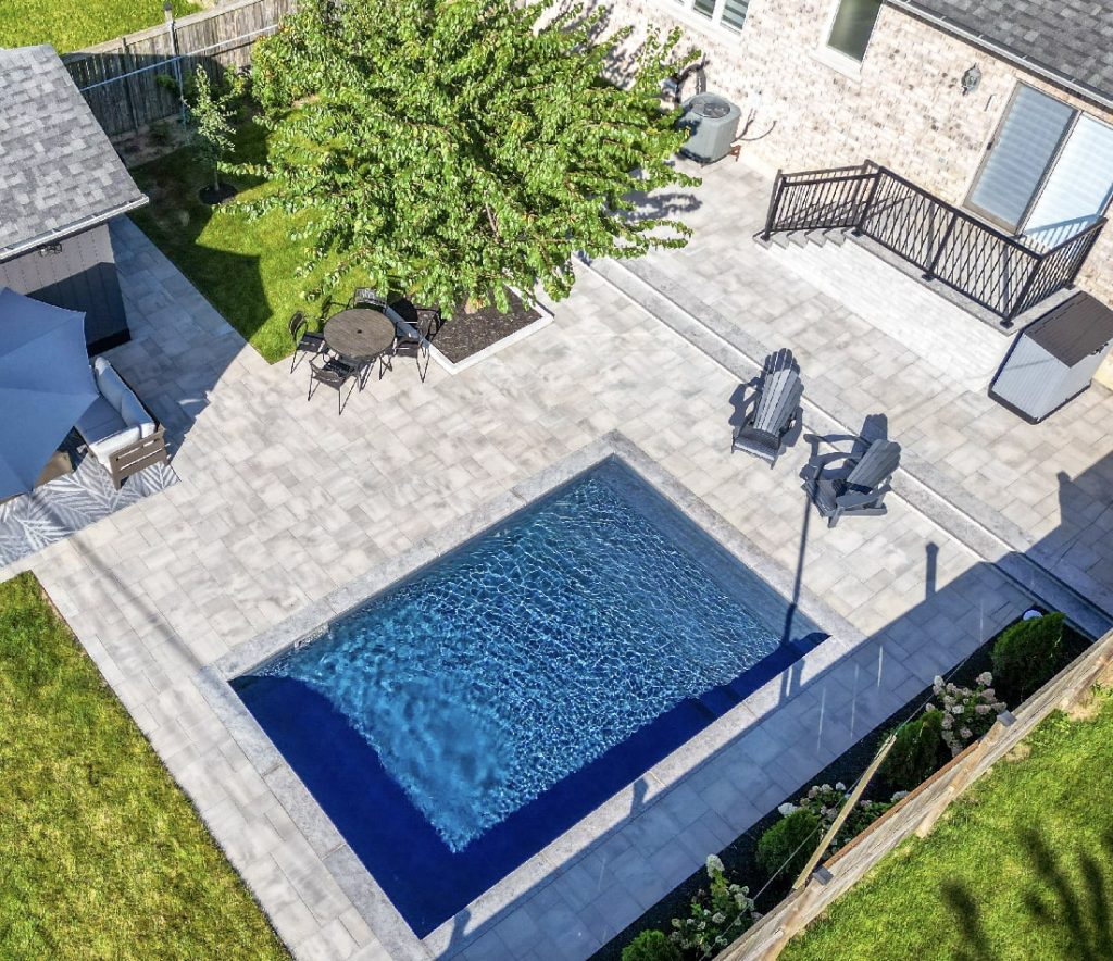 Beautiful Garden, Landscaping and Pool in Hamilton, Ontario. Build by Boulder Design.