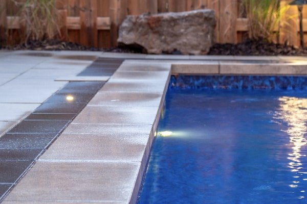 Oakville backyard transformation and pool installation by Boulder Design