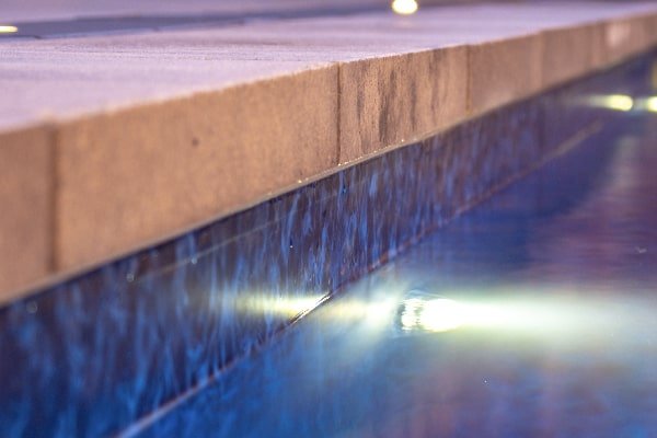 Oakville backyard transformation and pool installation by Boulder Design