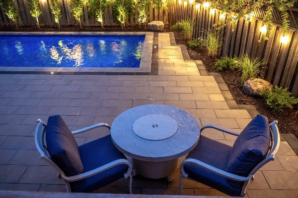 Oakville backyard transformation and pool installation by Boulder Design