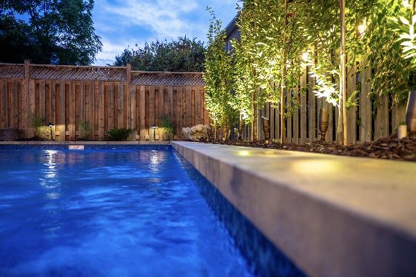 Oakville backyard transformation and pool installation by Boulder Design