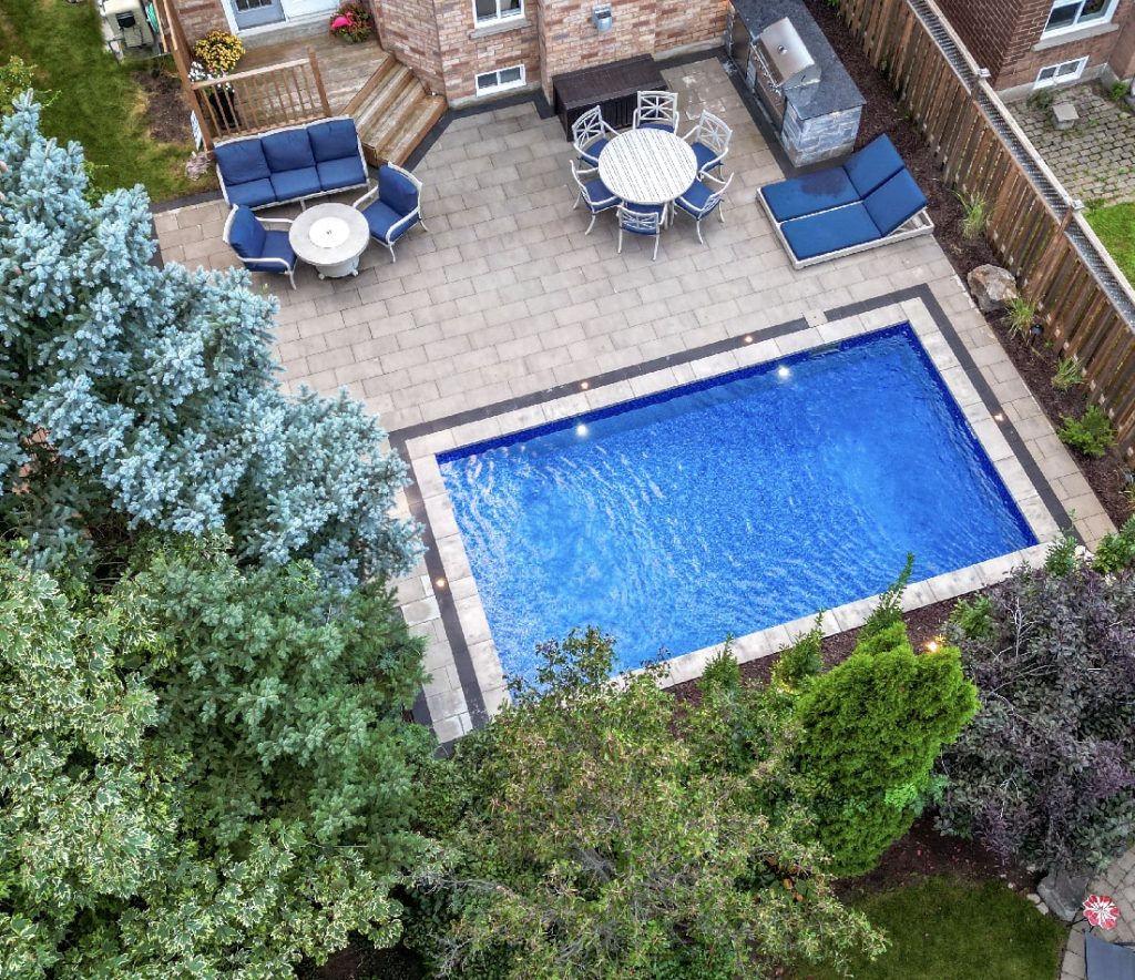 Oakville backyard transformation and pool installation by Boulder Design