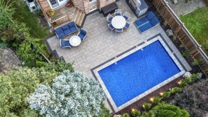 Oakville backyard transformation and pool installation by Boulder Design