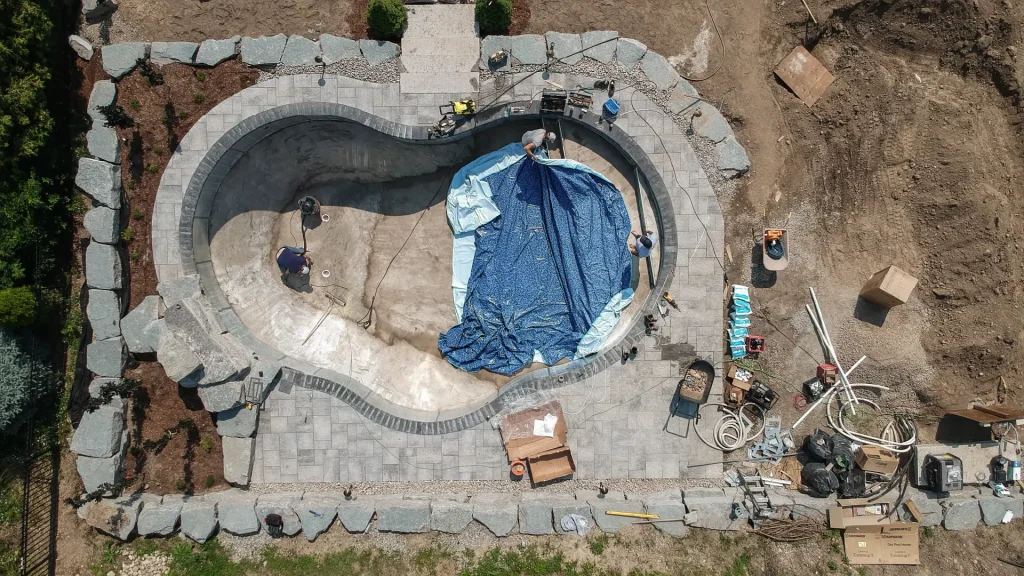 Drone photo of vinyl pool installation by Boulder Design