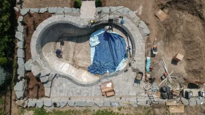 Drone photo of vinyl pool installation by Boulder Design