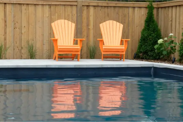 Ancaster new subdivision backyard transformation with in-ground pool and interlocking patio by Boulder Design Pools & Landscapes