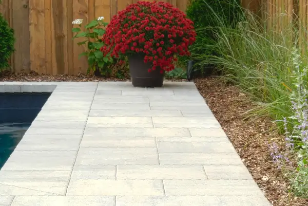 Ancaster new subdivision backyard transformation with in-ground pool and interlocking patio by Boulder Design Pools & Landscapes