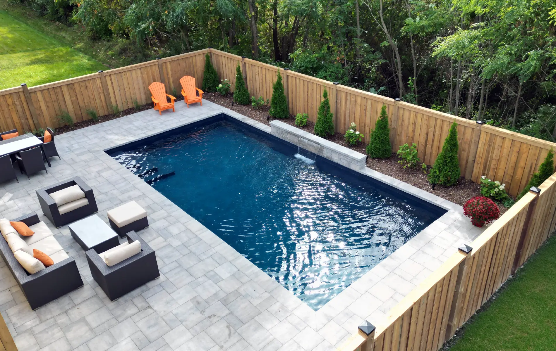 Ancaster new subdivision backyard transformation with in-ground pool and interlocking patio by Boulder Design Pools & Landscapes