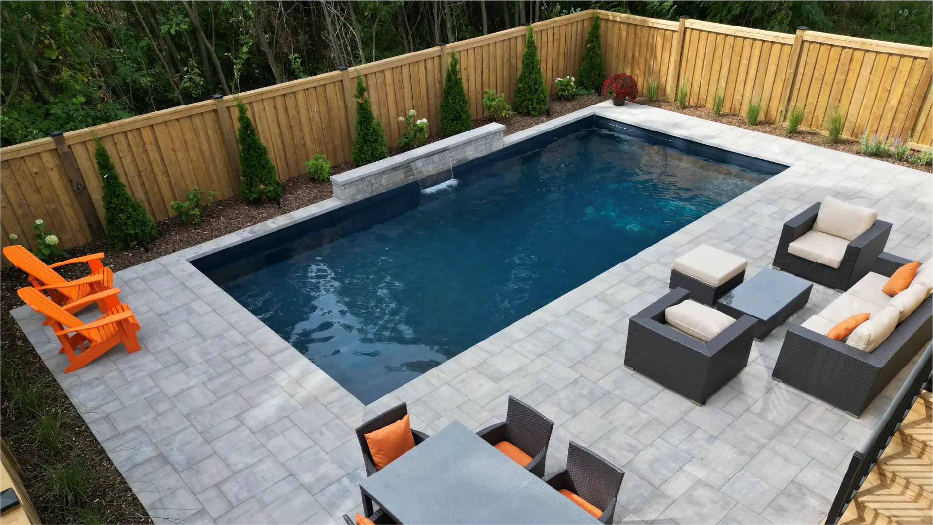 Ancaster new subdivision backyard transformation with in-ground pool and interlocking patio by Boulder Design Pools & Landscapes