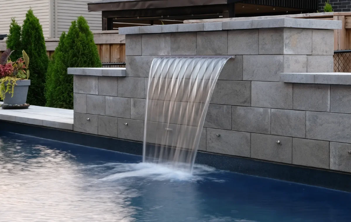 Boulder Design Pools & Landscapes, Beamsville, Ontario Front and Backyard Pool Install and Landscaping