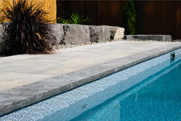 Caledonia backyard pool build and design by Boulder Design Pools and Landscapes.
