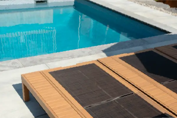 Caledonia backyard pool build and design by Boulder Design Pools and Landscapes.
