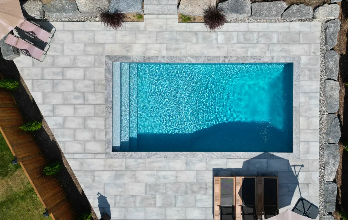 Caledonia backyard pool build and design by Boulder Design Pools and Landscapes.