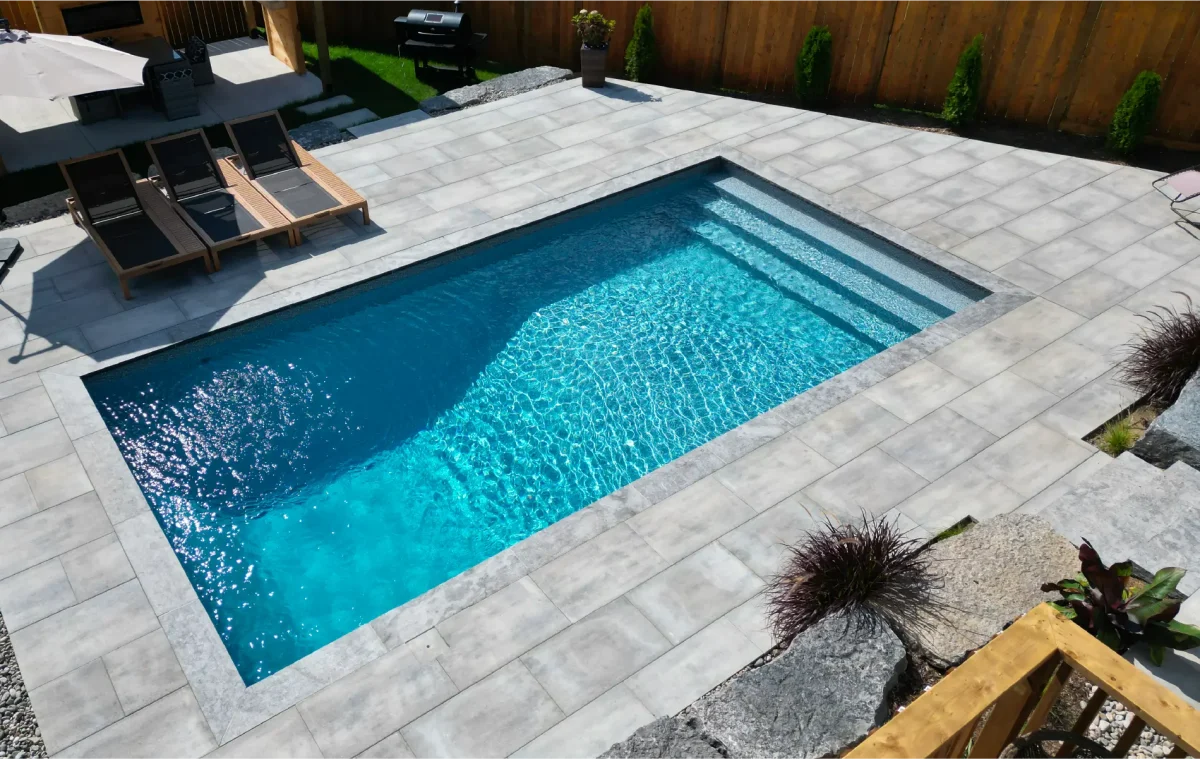 Caledonia backyard pool build and design by Boulder Design Pools and Landscapes.