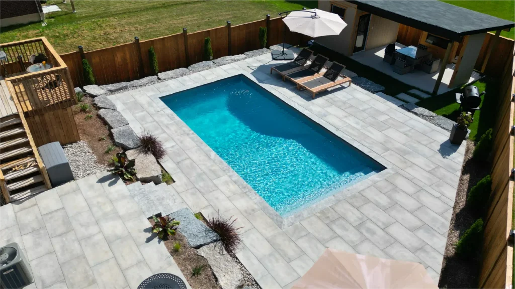 Caledonia backyard pool build and design by Boulder Design Pools and Landscapes.